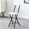 Modern folding chair with white seat back and black metal frame, portable home dining chair. - Black Legs - Pure White