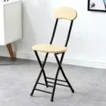 Portable folding chair with wooden seat and backrest plus black metal frame for home dining. - Black Legs - Light Wood Grain