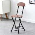 Modern minimalist folding chair with wood grain seat and black metal frame for home use. - Black Legs - Dark Wood Grain