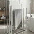 White metal freestanding towel rack with tiered bars for bathroom storage and organization. - 41.5x25x84cm / White