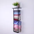 Wall-mounted metal storage rack for bathroom kitchen towel organization with plant decor. - Triple Layer / Black