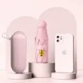 Kompakter rosa Mini Kapsel Regenschirm UV Schutz tragbarer Klappschirm fuer Damen Regen - 6 Rippen 5 Falten Regenschirm mit Box / Hellrosa