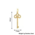 Detailed view of the gold stainless steel key pendant featuring pave crystal rhinestones. - 27mm Fleur-de-lis Key / Silver (PJ0183-01*Small Iris)