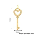 Close-up details of the crystal-encrusted heart key pendant showcasing exquisite metal craftsmanship. - 36mm Heart Key / Silver (PJ0181-01*Large Heart)