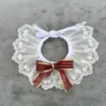 Detailed view of pet lace collar with white ruffles and elegant burgundy gold bow decoration. - Burgundy