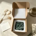 Natural green marble round coaster set with metal holder in gift box, premium home decor item. - Snowflake Green Round Set of 4