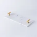 Plateau en marbre blanc avec poignées dorées pour parfum, cosmétiques et décoration chic. - Petit plateau en T blanc étoilé avec poignée de luxe