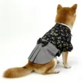 Detailed view of the Japanese style pet kimono dog clothes with floral print and bow. - Navy Blue Dog Paw Prints