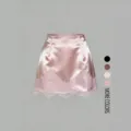 Pink satin skirt detail featuring delicate white lace trim and smooth fabric texture. - S / Pink