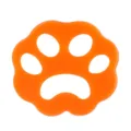 Orange paw pet hair remover for laundry machine, reusable silicone fur catcher and clothing lint cleaner. - Flower Orange