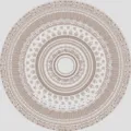 Vue détaillée d'un tapis rond au design bohème avec des motifs géométriques tribaux. - BO tapis persans - 12