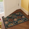 Vintage floral doormat detail showcasing rich blue background and colorful retro pattern. - 40*60cm (Faux Cashmere Plastic Dot Bottom) / Floral 1