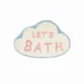 Detail shot of the cute cloud shaped tufted rug with blue border and pink letters text. - Light Clouds C