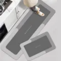 Kitchen floor mat detail showing diatomite absorbent surface and anti-slip backing structure. - Morandi 1