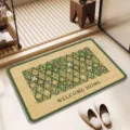 Detailed view of the woven bathroom floor mat featuring a geometric pattern and green border. - 40*60cm / Birthday Puppy