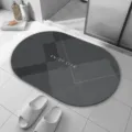 Détail de tapis de bain ovale en terre de diatomée gris, surface antidérapante. - 40x60cm (Peluche Douce) / QD526-11