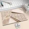 Detail shot of the minimalist geometric absorbent bathroom floor mat with leather and marble texture. - 12226YSDD-7