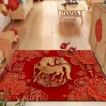 Detailed view of the 2026 Year of the Horse red doormat, featuring golden horse and floral patterns. - Year of the Horse Red Doormat - Style 08