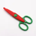 Detailed view of colorful craft lace scissors for clay and paper DIY, wavy edge design. - Small Wavy