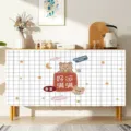 Schrank Staubtuch Detailansicht mit süßem Bärenmuster und modernem kariertem Stoffdesign. - Viel Glück