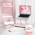 Pink carbon steel laptop stand with hollow cat paw design, adjustable double arm and folding storage. - Computer Style / Cat Paw Pink