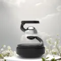 Difusor de perfume para coche de levitación magnética aromaterapia solar giratoria adorno - Acuático / Negro