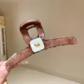 Brown tortoise shell hair claw clip with elegant white square and gold puppy accent for women. - Dark Brown Marble