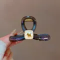 Molla per capelli in acrilico aurora scuro con cagnolino dorato per stile elegante. - Viola Olografico