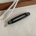 Elegante fermaglio per capelli nero con fiori di strass scintillanti per donne e ragazze. - Nero