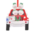 Wooden Christmas tree hanging ornament featuring family in a red truck for holiday decor. - 4-Person Style