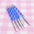 Close-up of silicone nail art carving pens with blue handles, highlighting soft tips. - Rotating Style, Blue