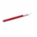 Red metal craft knife detail showing the 30-degree bevel blade and ergonomic handle for DIY. - Red