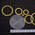 Miniature circle carbon steel cutting dies set for clay doll crafts, precise craft detail view. - Circle Carbon Steel Cutting Dies