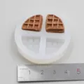 Miniature waffle silicone mold detail showing texture and size with metal ruler scale. - Triangular Biscuit Silicone Mold