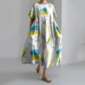Casual loose short-sleeve dress with blue and yellow floral print, comfortable summer wear. - Floral Wheat Style