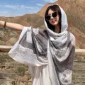 Detail view of a thin summer beach sunscreen large scarf shawl with elegant floral print. - 180x130cm / 4# - Mystic Gray