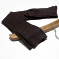 Brown cable knit over-the-knee socks detail view, soft cotton texture, cozy winter accessory. - One Size / Coffee