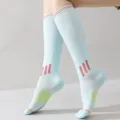 Light blue athletic calf compression socks with pink stripes and arch support for sports running. - Size 35-39 / Blue