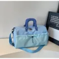 Sac de voyage bleu clair avec bandoulière et poche avant pour fitness yoga sport. - Bleu lac