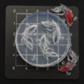 Close-up detail of miniature goldfish silicone mold for resin and clay crafts, clear grid. - Style C