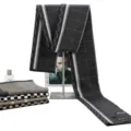 Detailed view of winter thick knit wool scarf with classic black and white plaid pattern. - W10-103