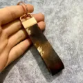 Vintage cowhide hair-on-hide leather keychain with rose gold hardware bohemian pendant. - Style 1