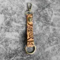 Western vintage genuine leather embossed keychain with metal bull skull charm and lobster clasp - Bull Head Pattern Style (1)