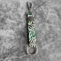 Detailed view of western genuine leather embossed keychain with metal hardware and vintage concho. - Green White Retro Style (5)