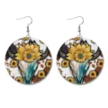 Detailed view of western vintage round leather earrings with sunflower and cow skull print. - Bull Skull Sunflower Round Style