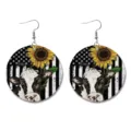 Detailed view of western vintage leather earrings featuring cow sunflower and flag pattern. - Cow Flag Round Style
