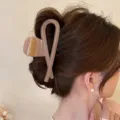 Elegante Haarklammer aus Acryl für Damen, schlichtes Kreuz-Design für stilvolle Hochsteckfrisuren. - Orange