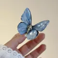 Elegant blue butterfly hair clip with pearl chain detail, fairy style sweet side clip for women. - Light Blue