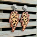 Detailed close-up shot of western style wooden leopard print lightning bolt dangle earrings. - Leopard Print (1)