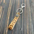 Leopard print calf hair keychain detail view with vintage metal bull skull charm accessory - Bull Head Style (3)